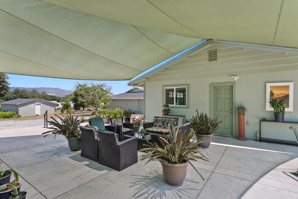 261 Wheelock Road Watsonville, CA 95076 - Photo 29 of 44 a view of a patio with plants and chairs