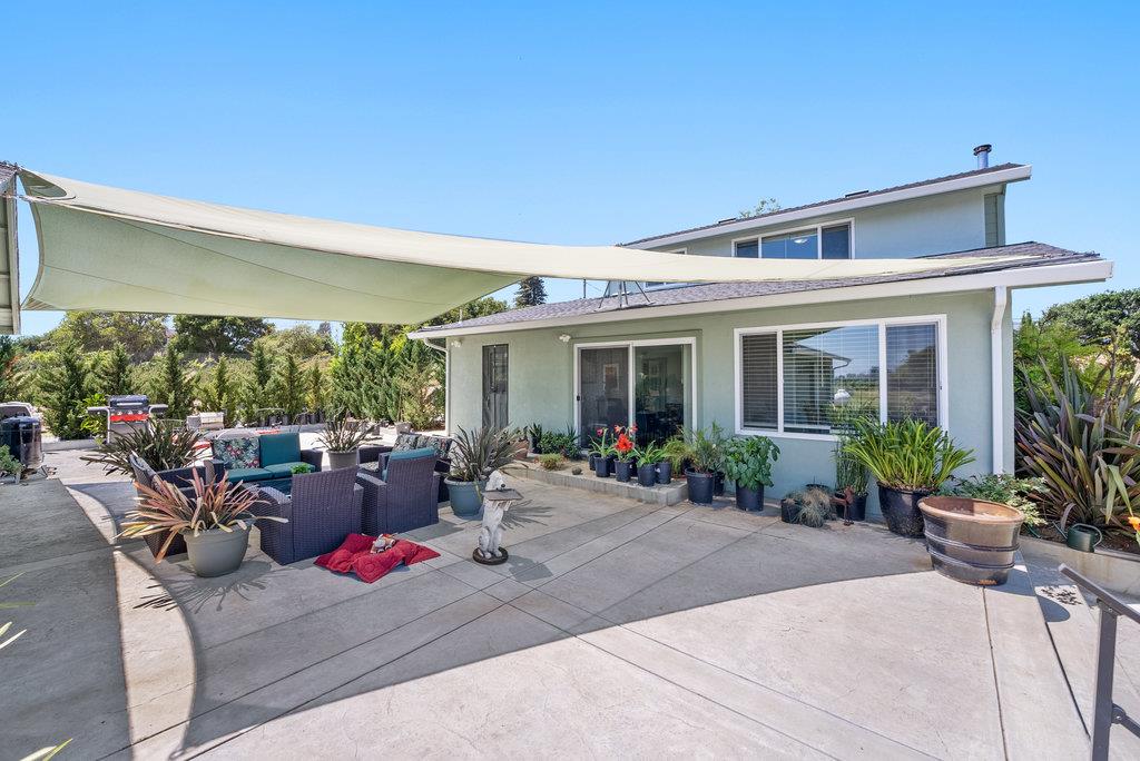 261 Wheelock Road Watsonville, CA 95076 - Photo 4 of 44 a view of a house with sitting area and garden