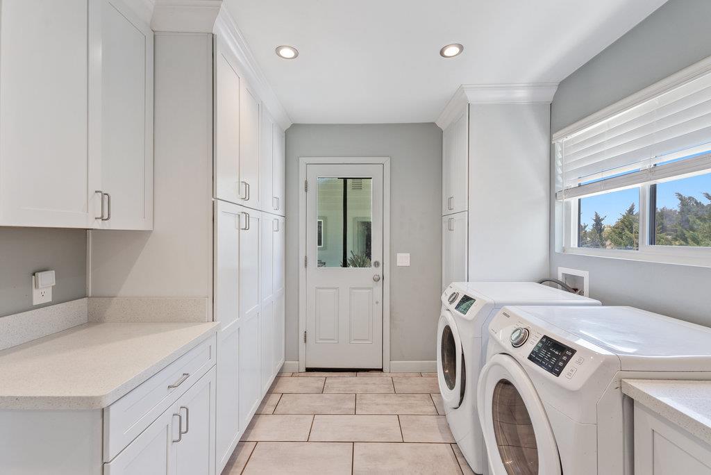 261 Wheelock Road Watsonville, CA 95076 - Photo 8 of 44 a view of a kitchen with sink and washer dryer