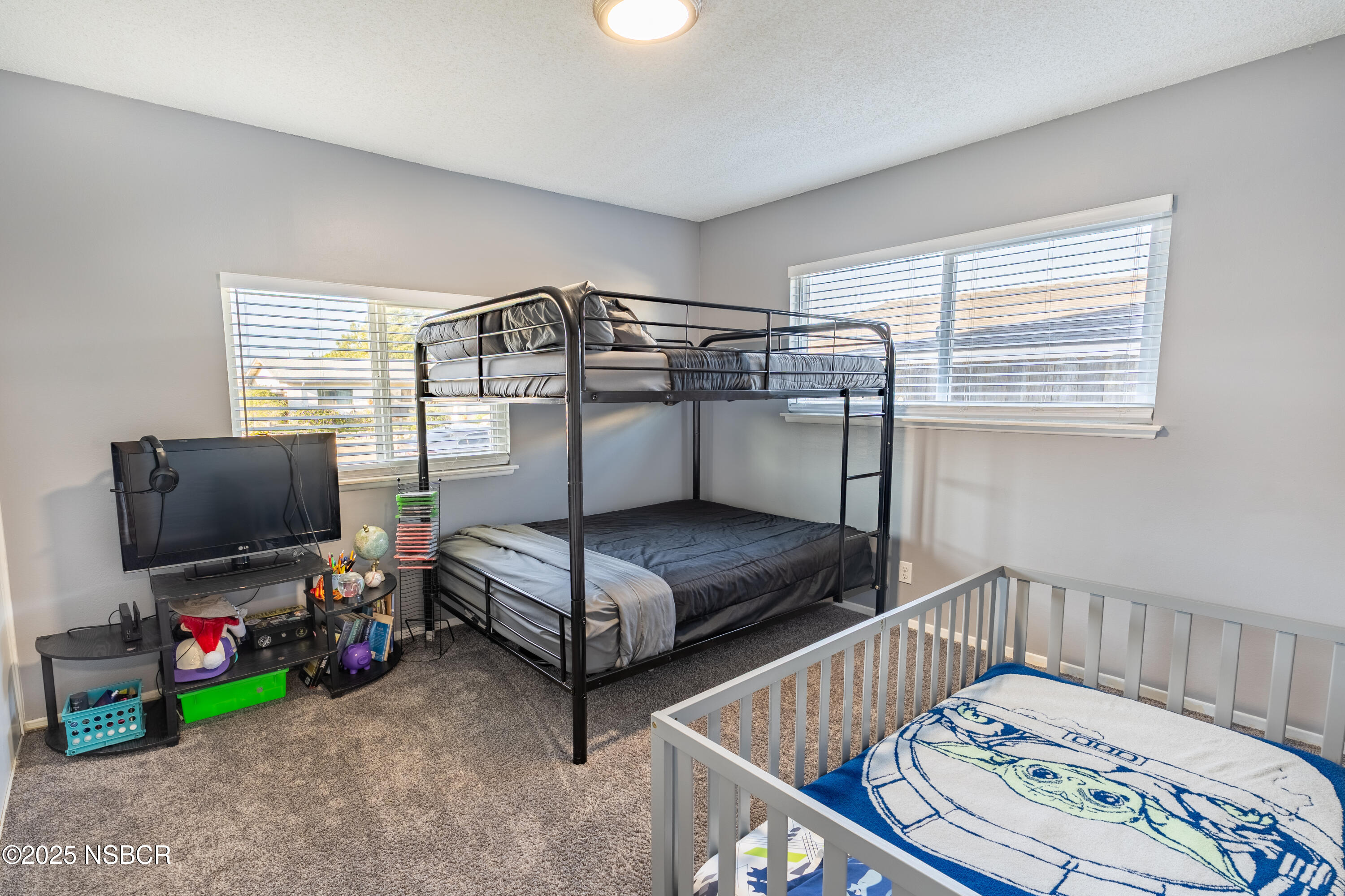 3478 Via Cortez Lompoc, CA 93436 - Photo 14 of 19 a bedroom with furniture and a flat screen tv