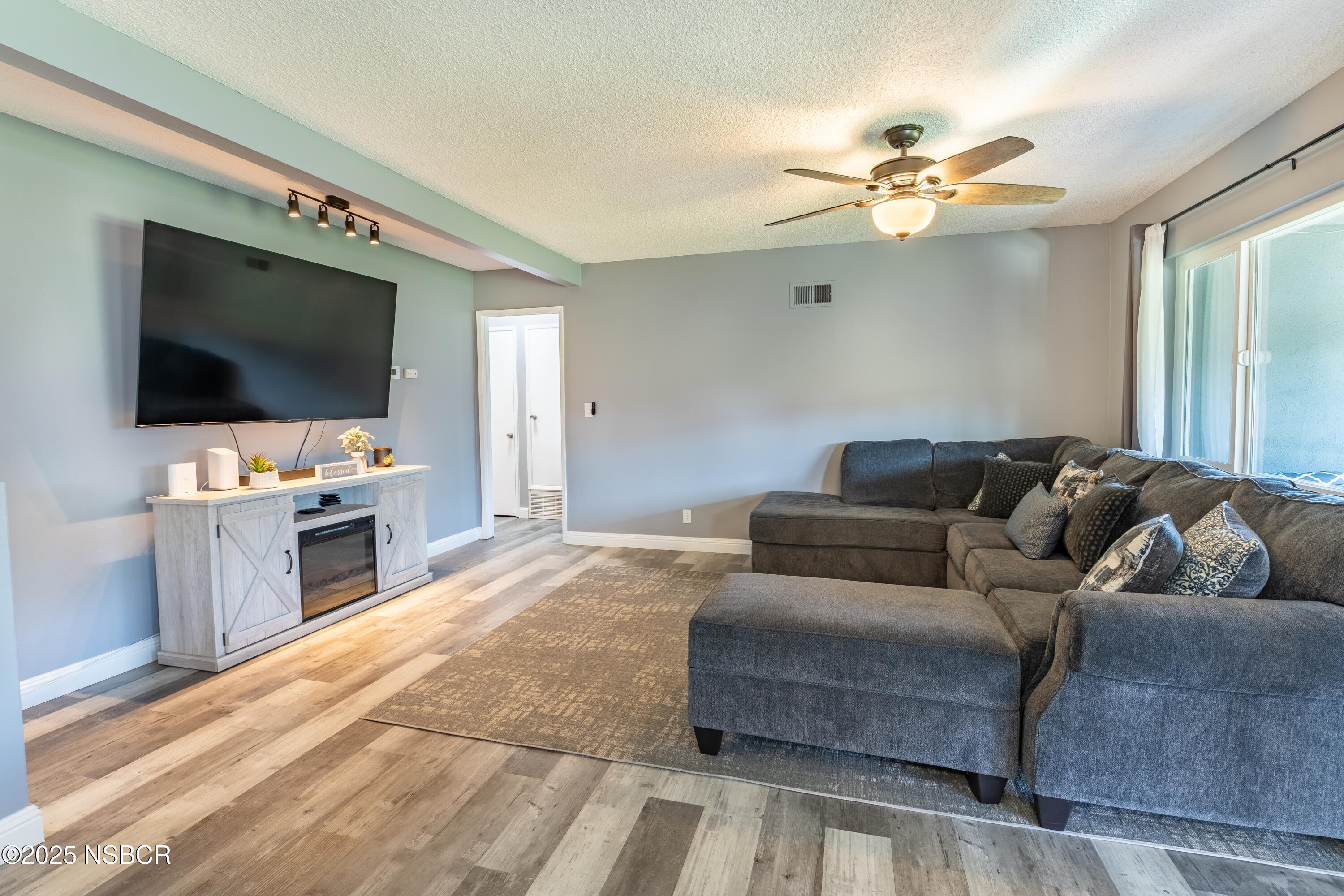 3478 Via Cortez Lompoc, CA 93436 - Photo 5 of 19 a living room with furniture and a flat screen tv