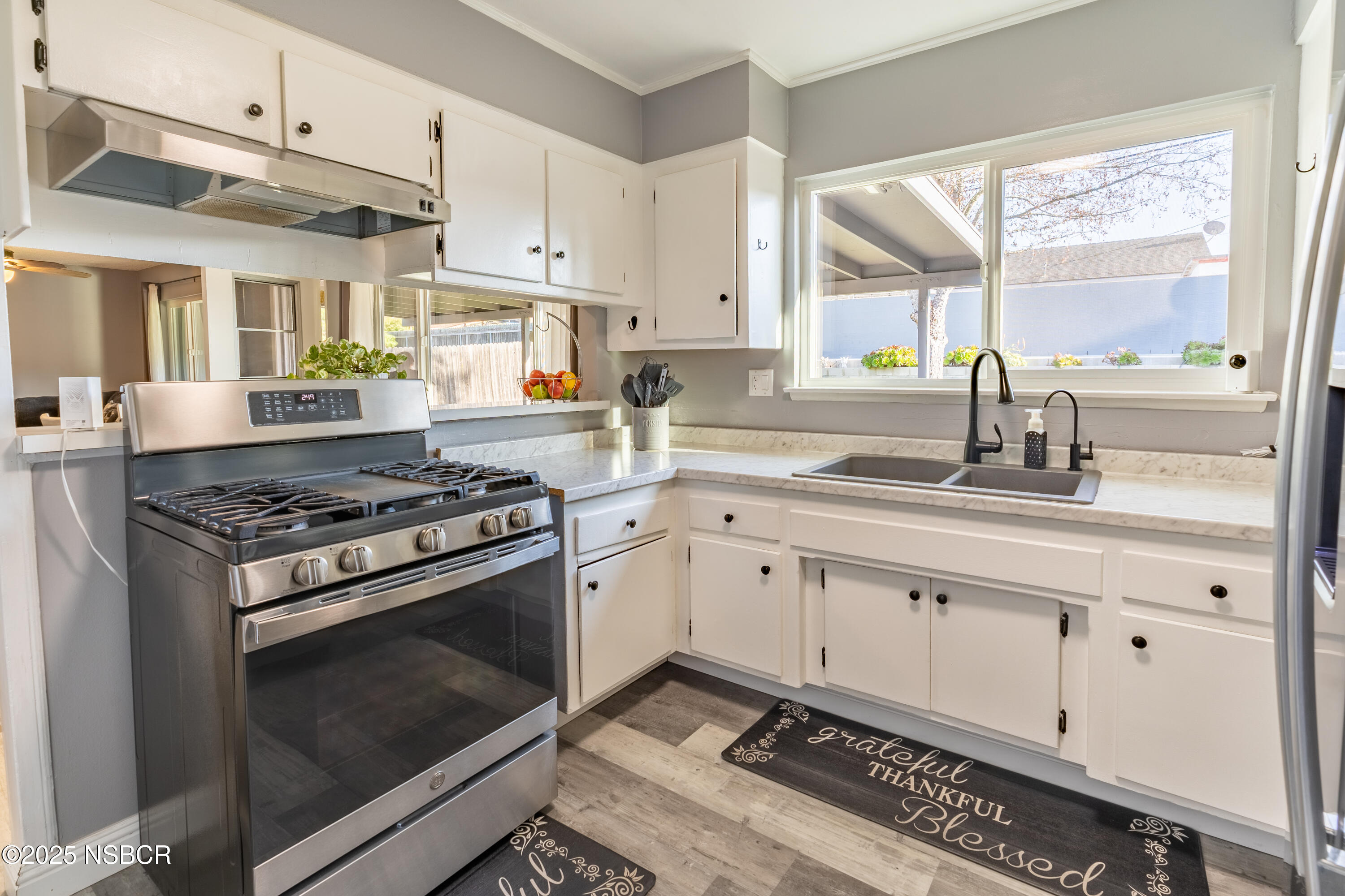 3478 Via Cortez Lompoc, CA 93436 - Photo 6 of 19 a kitchen with granite countertop cabinets stainless steel appliances and a window