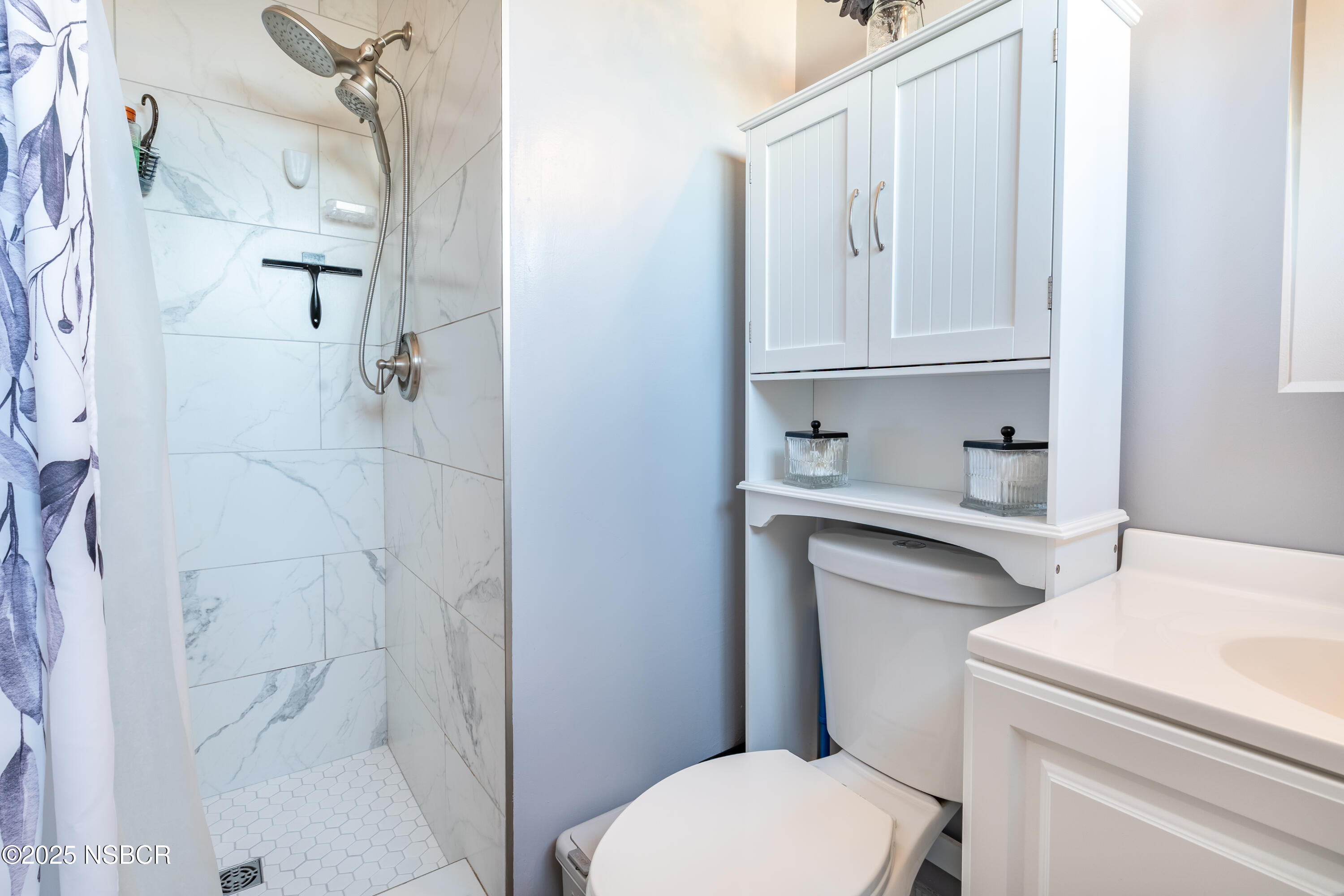 3478 Via Cortez Lompoc, CA 93436 - Photo 10 of 19 a bathroom with a toilet sink and shower