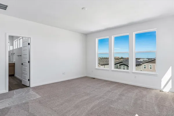 an empty room with windows