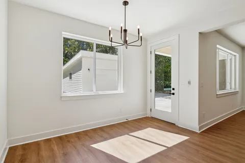 a view interior of the house with wooden floor and windows