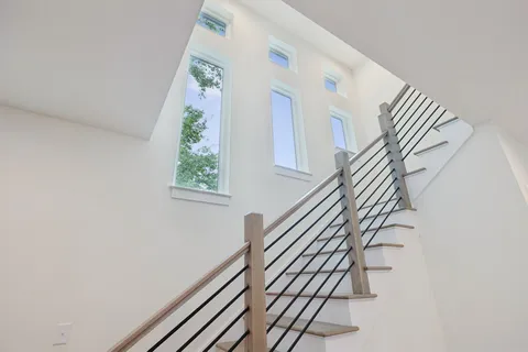a view of entryway with wooden floor