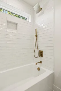 a bathroom with a sink and a window