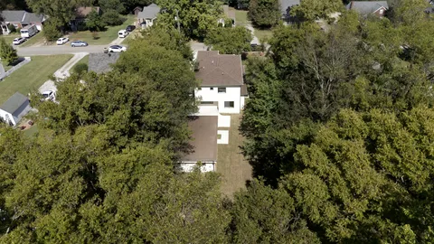 an aerial view of a city with lots of residential buildings