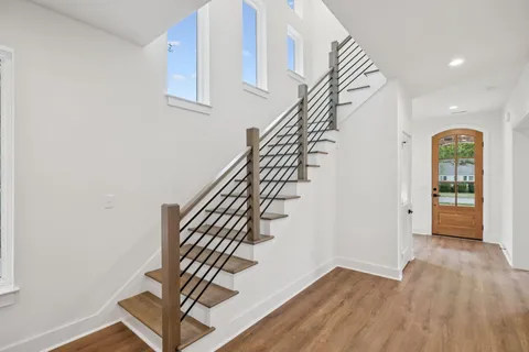 a view of entryway with wooden floor