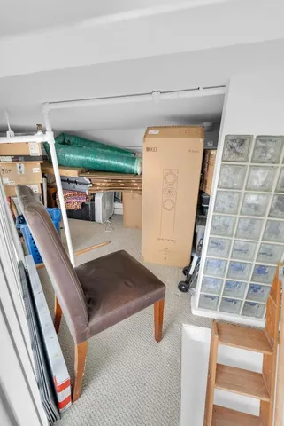 a view of a hallway with a bedroom