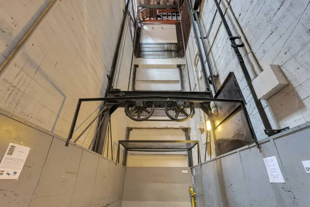 a view of hallway with walk in closet
