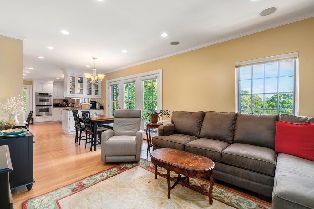 35 Shaw Road Brookline, MA 02467 - Photo 18 of 40 a living room with furniture and a large window