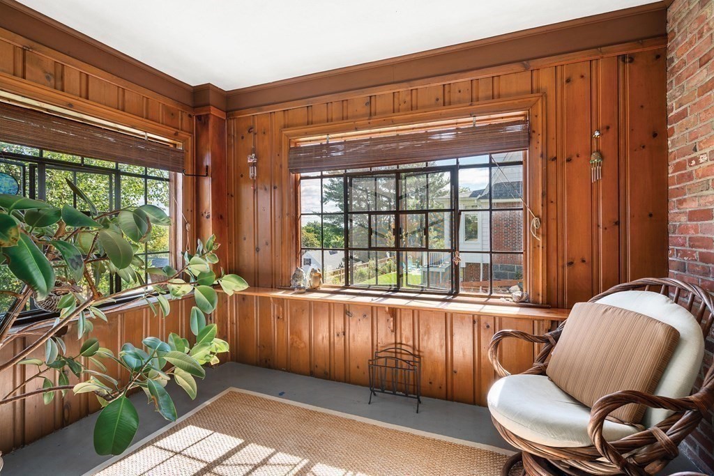 35 Shaw Road Brookline, MA 02467 - Photo 19 of 40 a living room filled with furniture and a large window