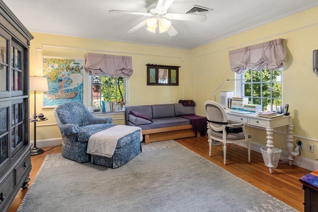 35 Shaw Road Brookline, MA 02467 - Photo 25 of 40 a living room with furniture and a large window