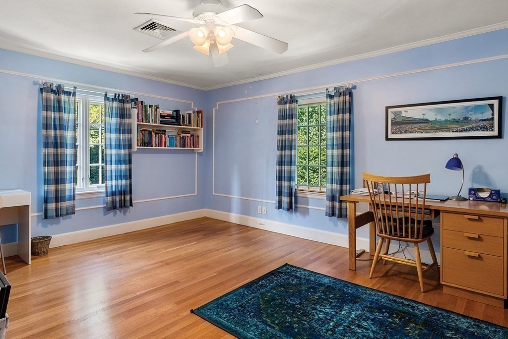 35 Shaw Road Brookline, MA 02467 - Photo 26 of 40 a living room with furniture and a window