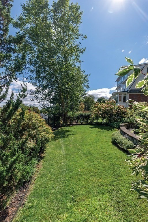 35 Shaw Road Brookline, MA 02467 - Photo 33 of 40 a view of a garden with lawn chairs