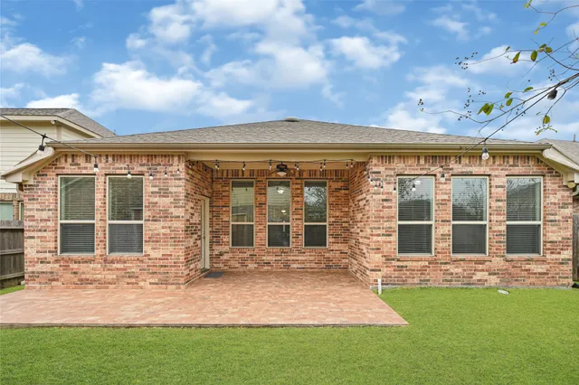 front view of a house with a garden