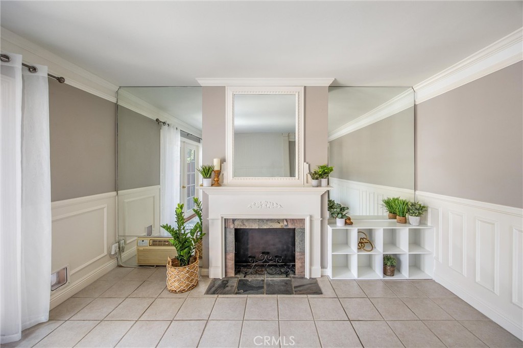 135 North Center Street Redlands, CA 92373 - Photo 11 of 36 a living room with furniture and a fireplace
