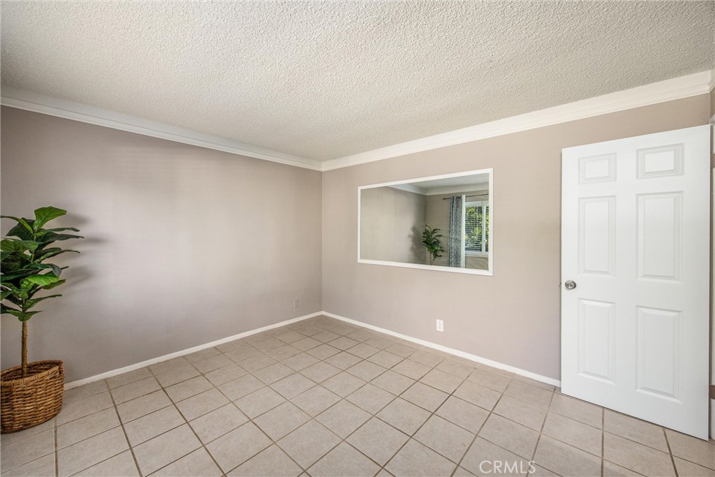 135 North Center Street Redlands, CA 92373 - Photo 18 of 36 a view of an empty room and window
