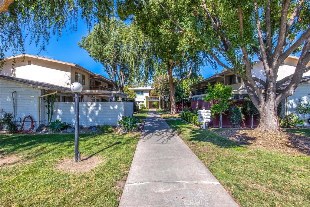 135 North Center Street Redlands, CA 92373 - Photo 2 of 36 a view of a house with a yard