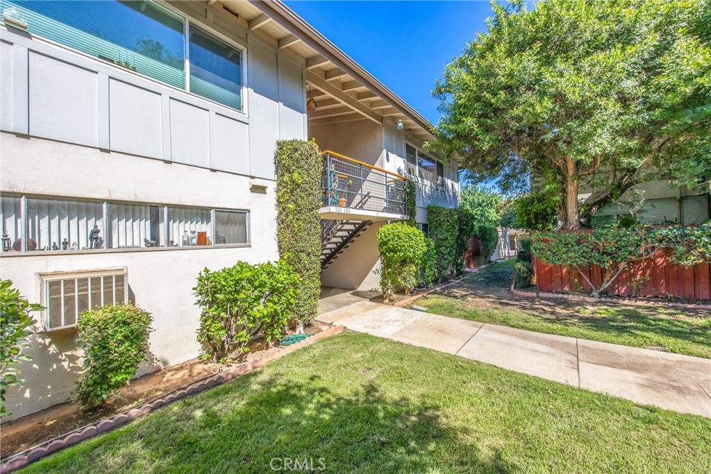 135 North Center Street Redlands, CA 92373 - Photo 5 of 36 a view of a house with a yard and plants