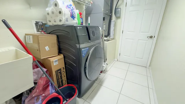 a utility room with dryer and washer