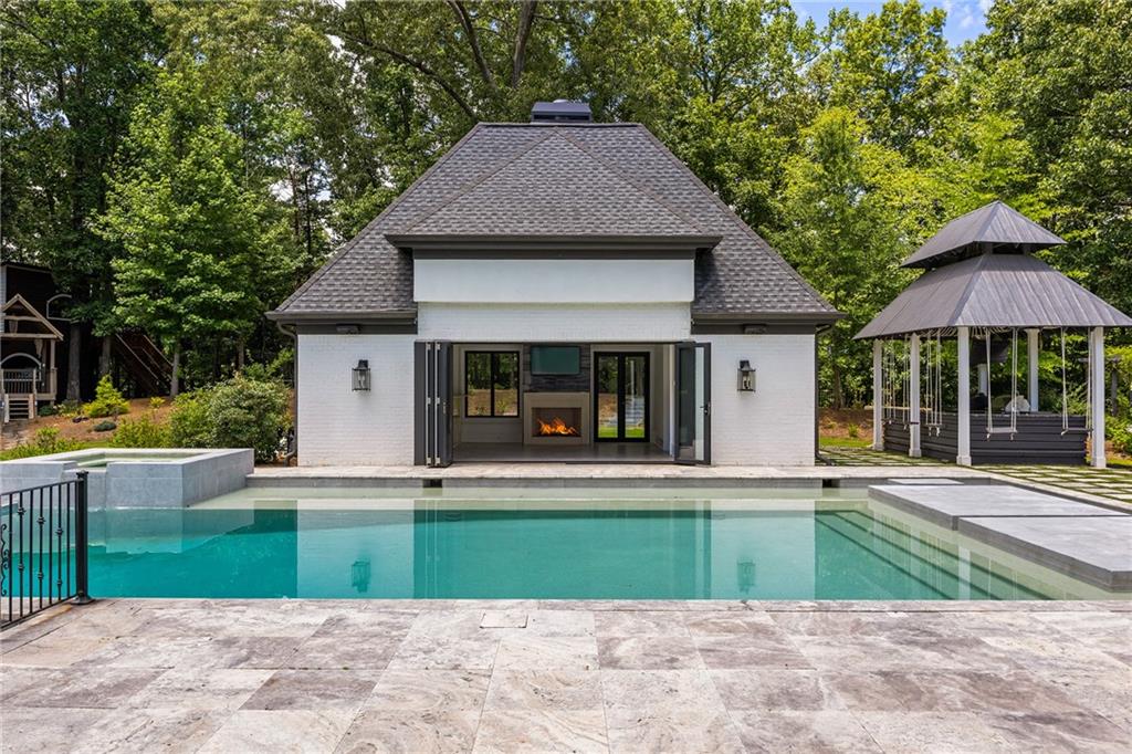 5320 Riverview Road Northwest Atlanta, GA 30339 - Photo 72 of 83 a view of house with outdoor space and sitting area