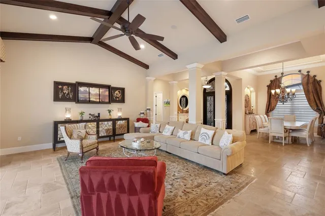 a kitchen with stainless steel appliances granite countertop a sink and a refrigerator
