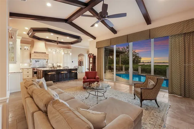 a bedroom with a large bed and a couch