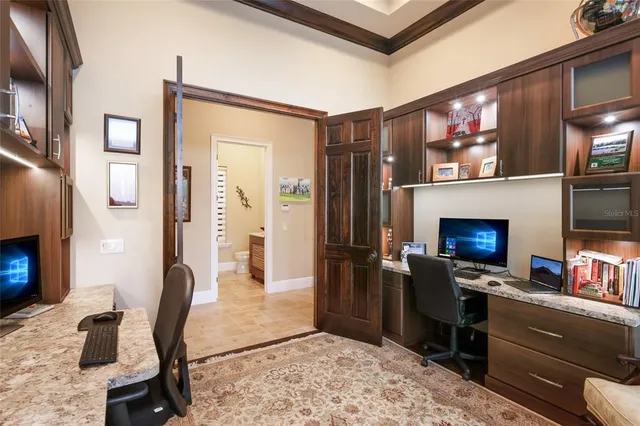 a bedroom with a bed and a dresser in it