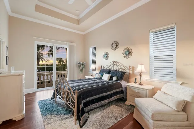 a outdoor living space with patio furniture and a view of lake