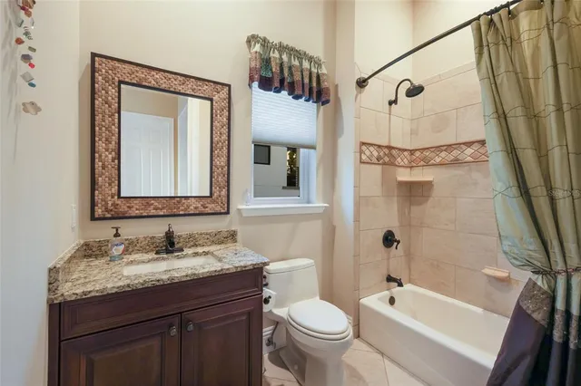 a view of a swimming pool with an outdoor seating