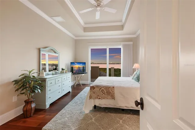 a view of a balcony with wooden floor and city view