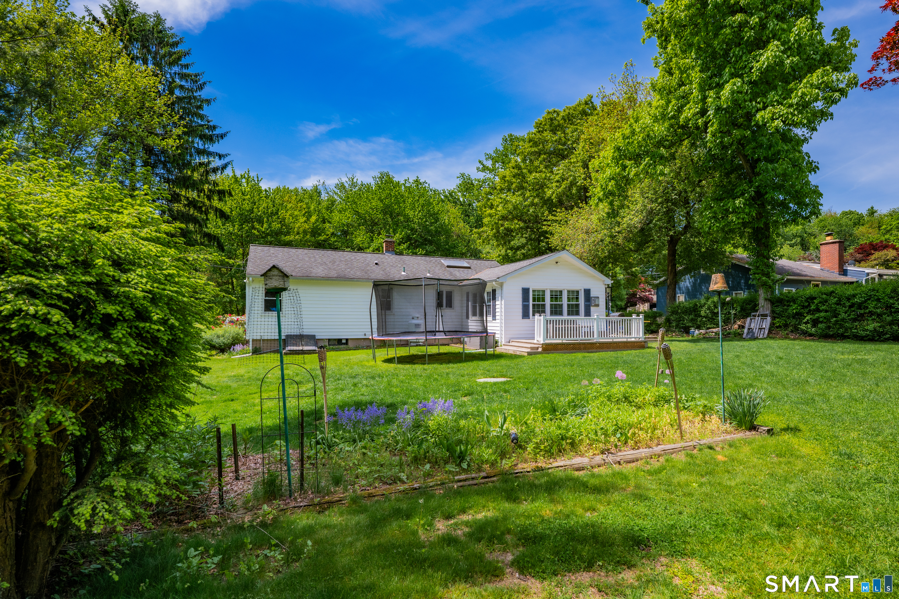 2 Hemlock Road Prospect, CT 06712 - Photo 26 of 27 a house with green field in front of it