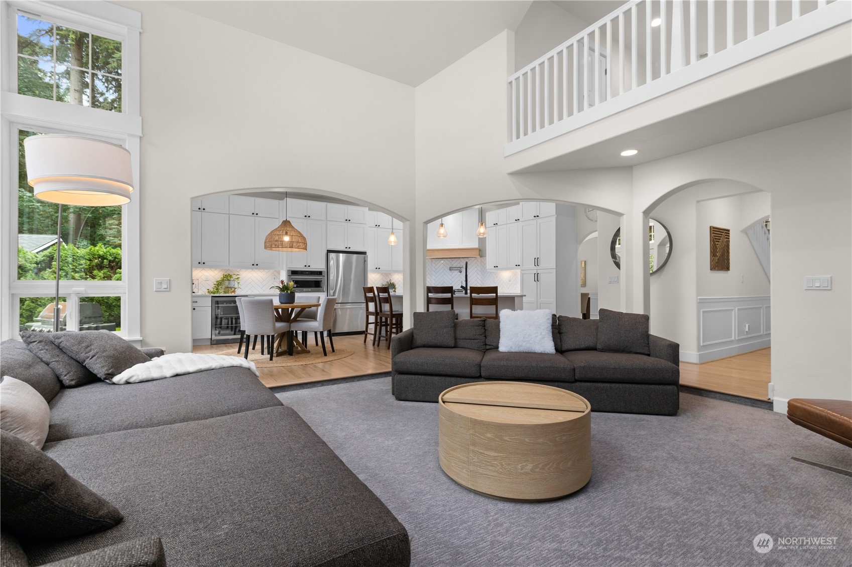 20919 29th Avenue Southeast Bothell, WA 98021 - Photo 11 of 32 a living room with furniture and a large window