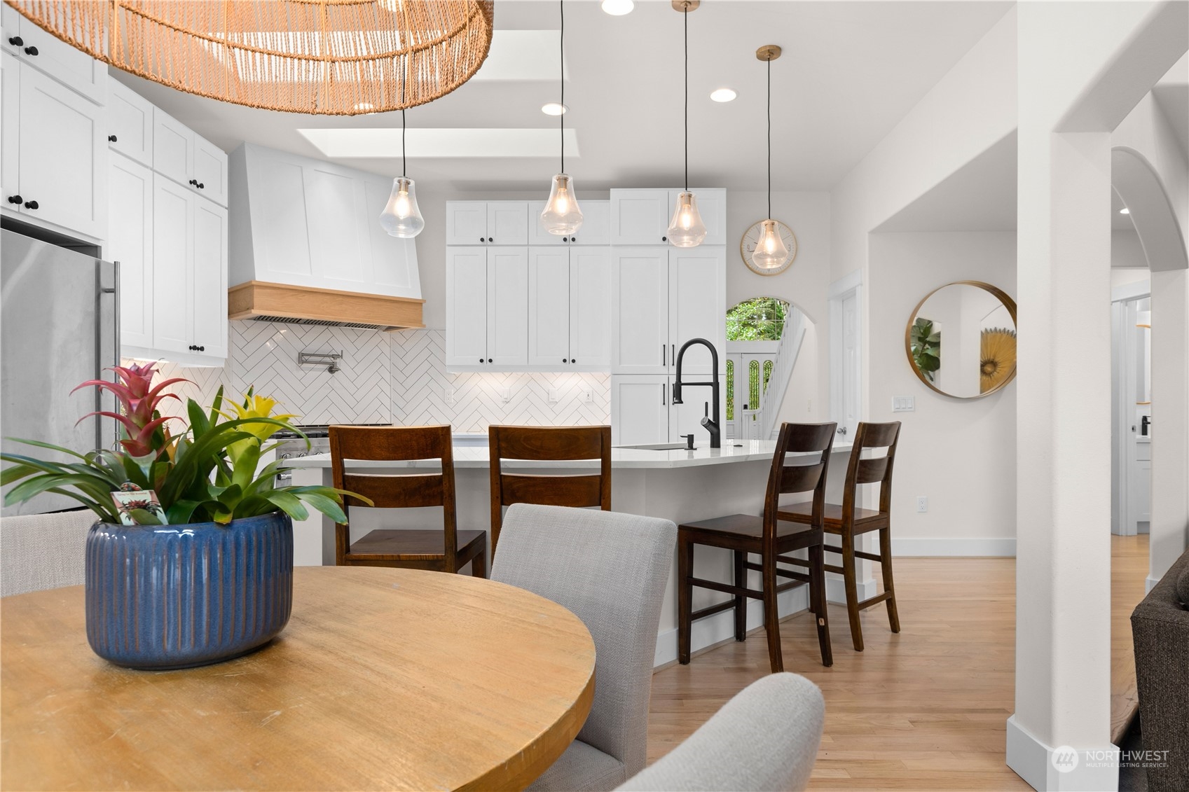 20919 29th Avenue Southeast Bothell, WA 98021 - Photo 19 of 32 a kitchen with a table and chairs in it