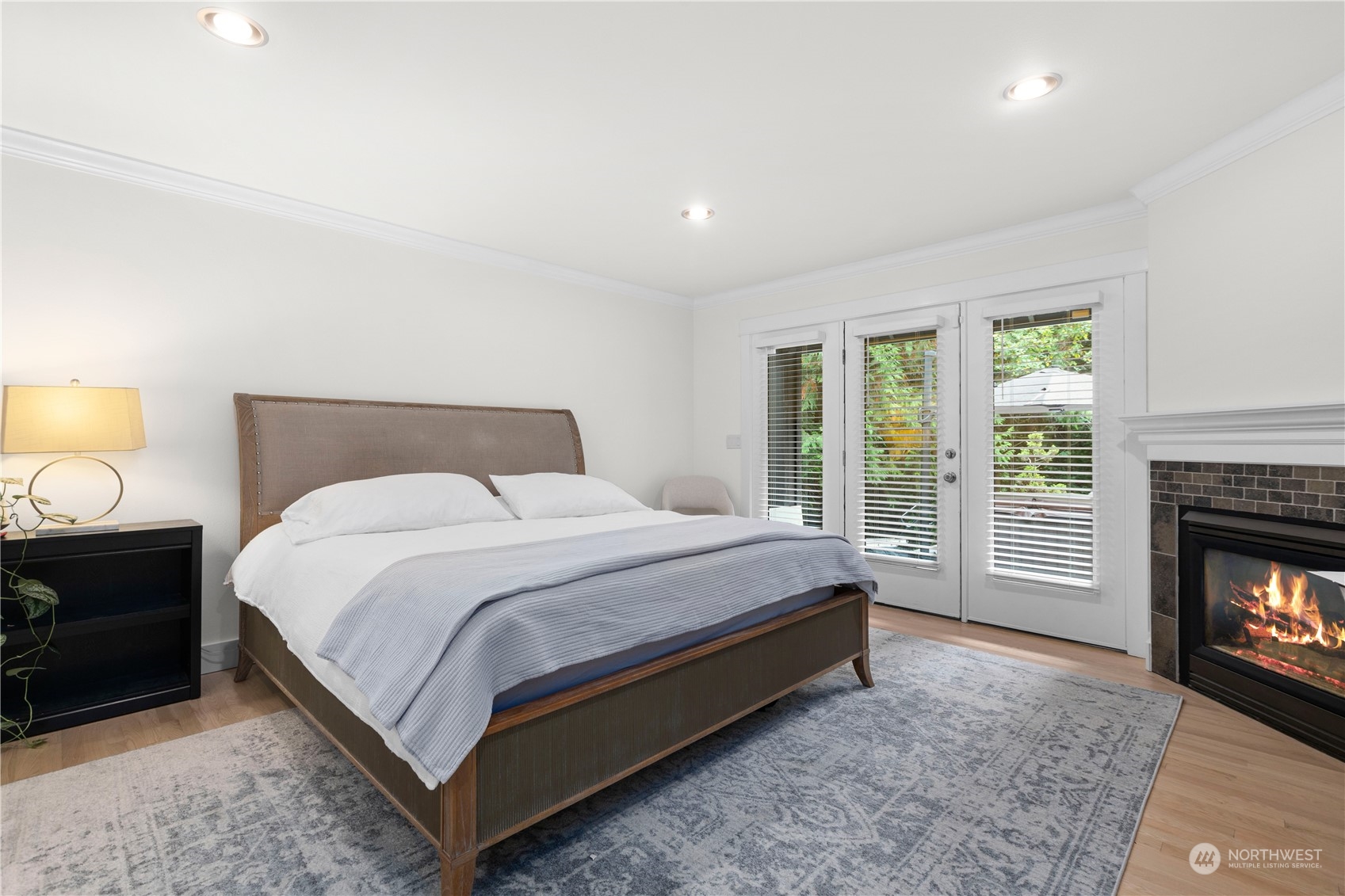 20919 29th Avenue Southeast Bothell, WA 98021 - Photo 21 of 32 a bedroom with a bed and a fireplace