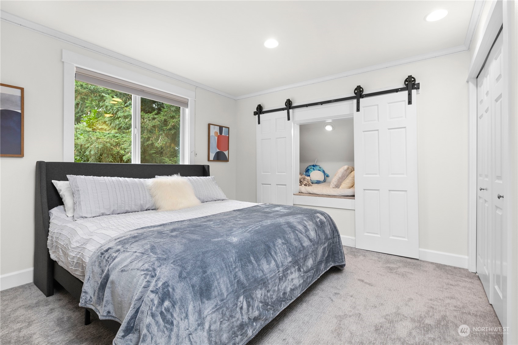 20919 29th Avenue Southeast Bothell, WA 98021 - Photo 25 of 32 a bedroom with a bed and a window