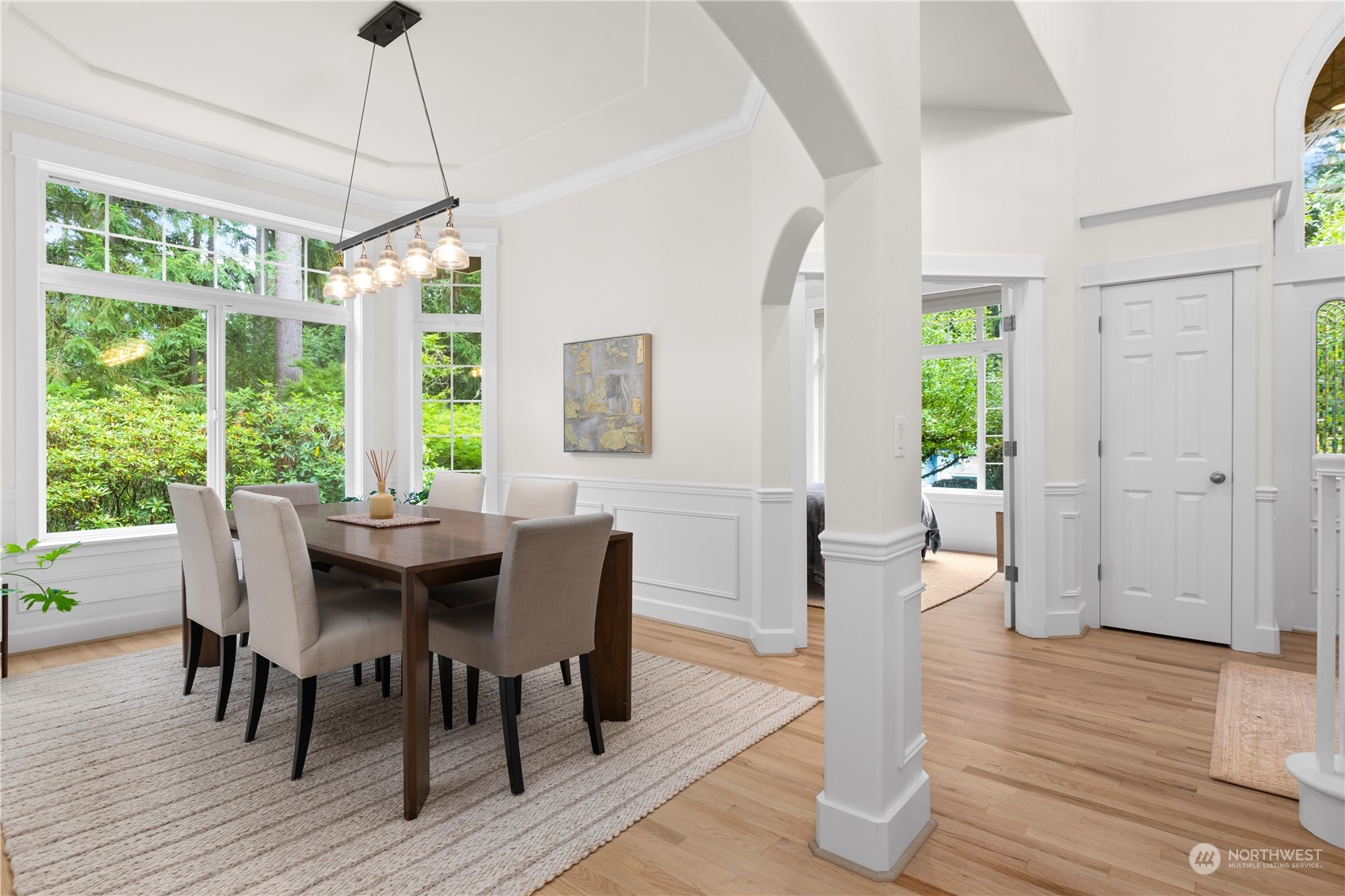 20919 29th Avenue Southeast Bothell, WA 98021 - Photo 8 of 32 a view of a dining room with furniture window and wooden floor