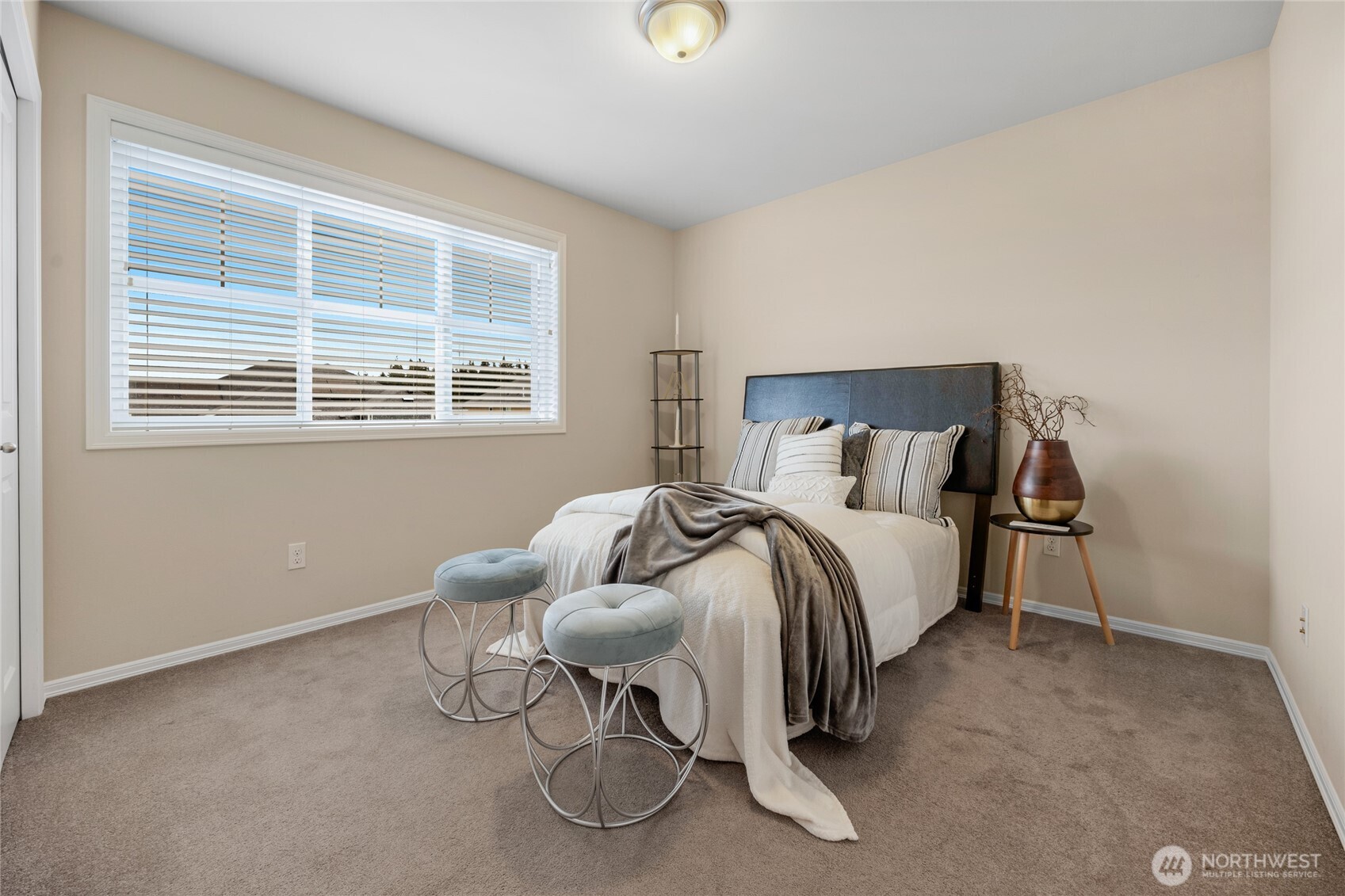 4326 221st Street Southeast Bothell, WA 98021 - Photo 19 of 34 a bedroom with a bed and a window