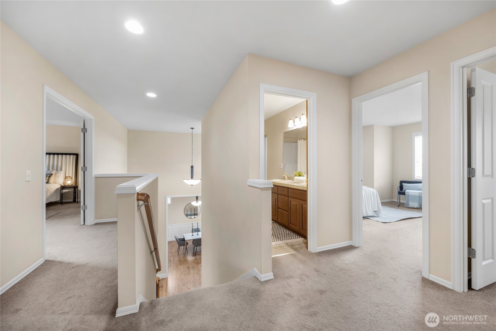 4326 221st Street Southeast Bothell, WA 98021 - Photo 22 of 34 a view of a hallway with furniture and a livingroom