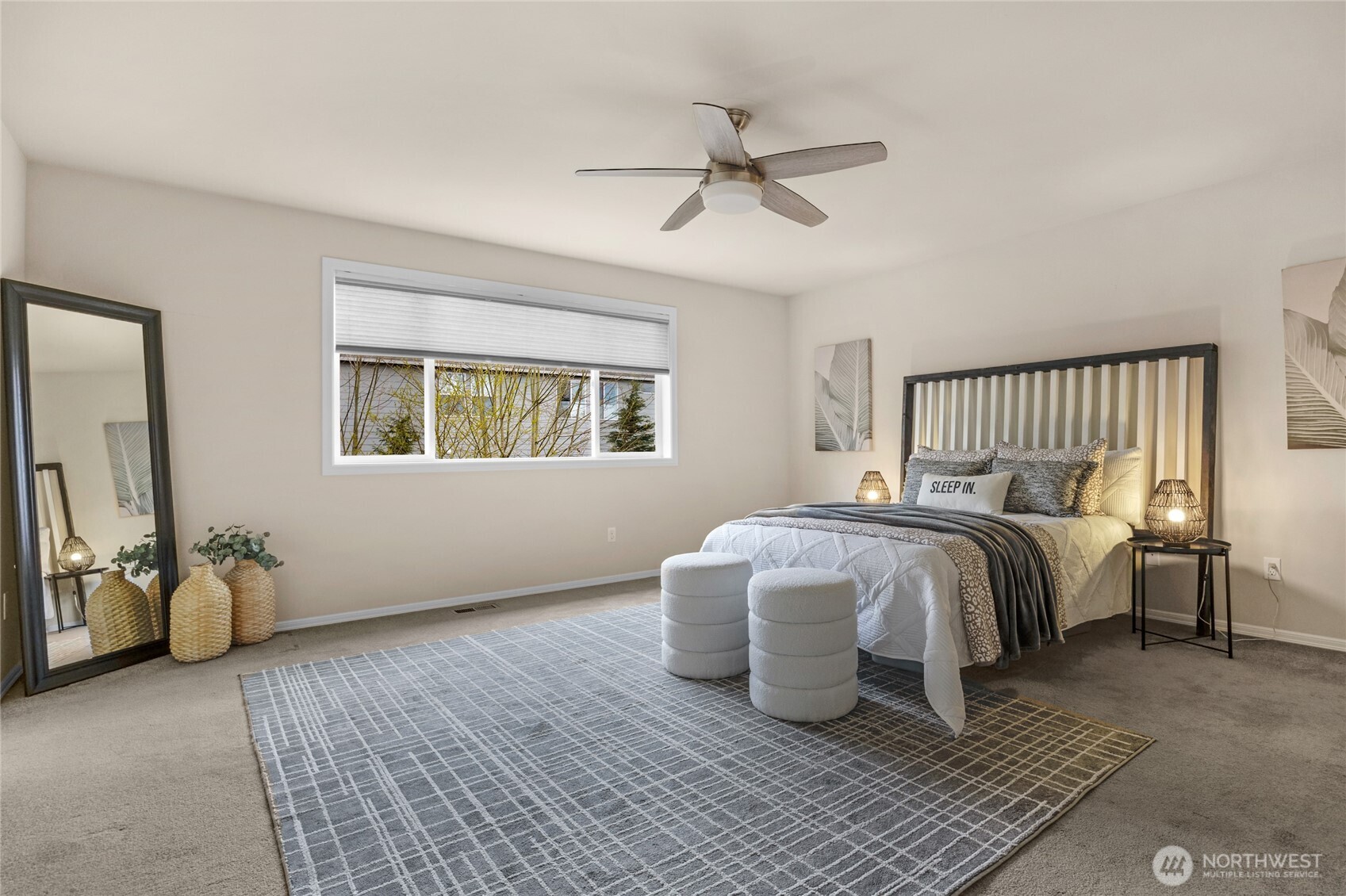 4326 221st Street Southeast Bothell, WA 98021 - Photo 23 of 34 a bedroom with a bed and wooden floor