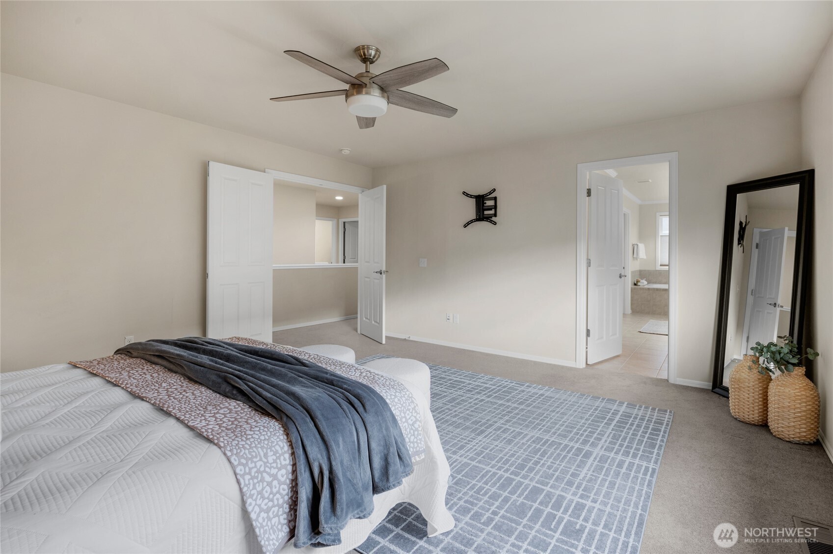 4326 221st Street Southeast Bothell, WA 98021 - Photo 24 of 34 a bedroom with a bed and a potted plant
