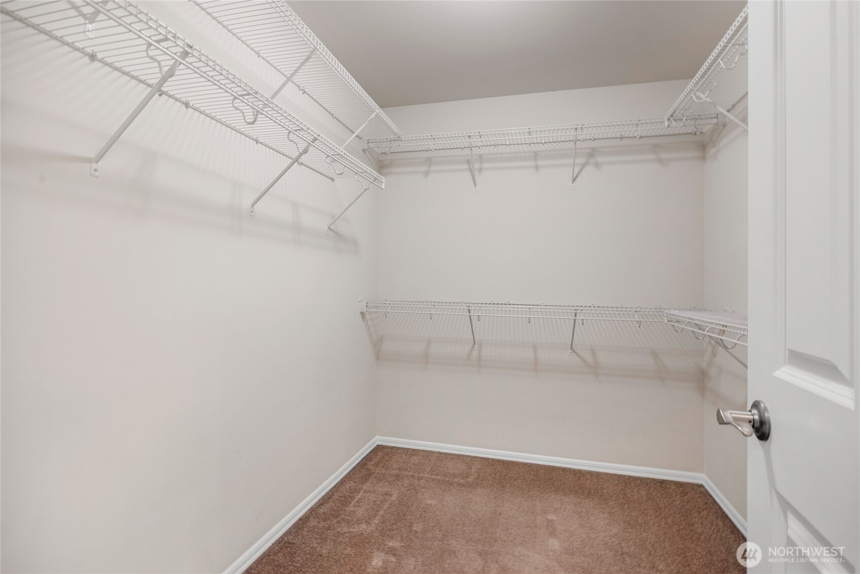 4326 221st Street Southeast Bothell, WA 98021 - Photo 25 of 34 a view of a room with racks on the wall