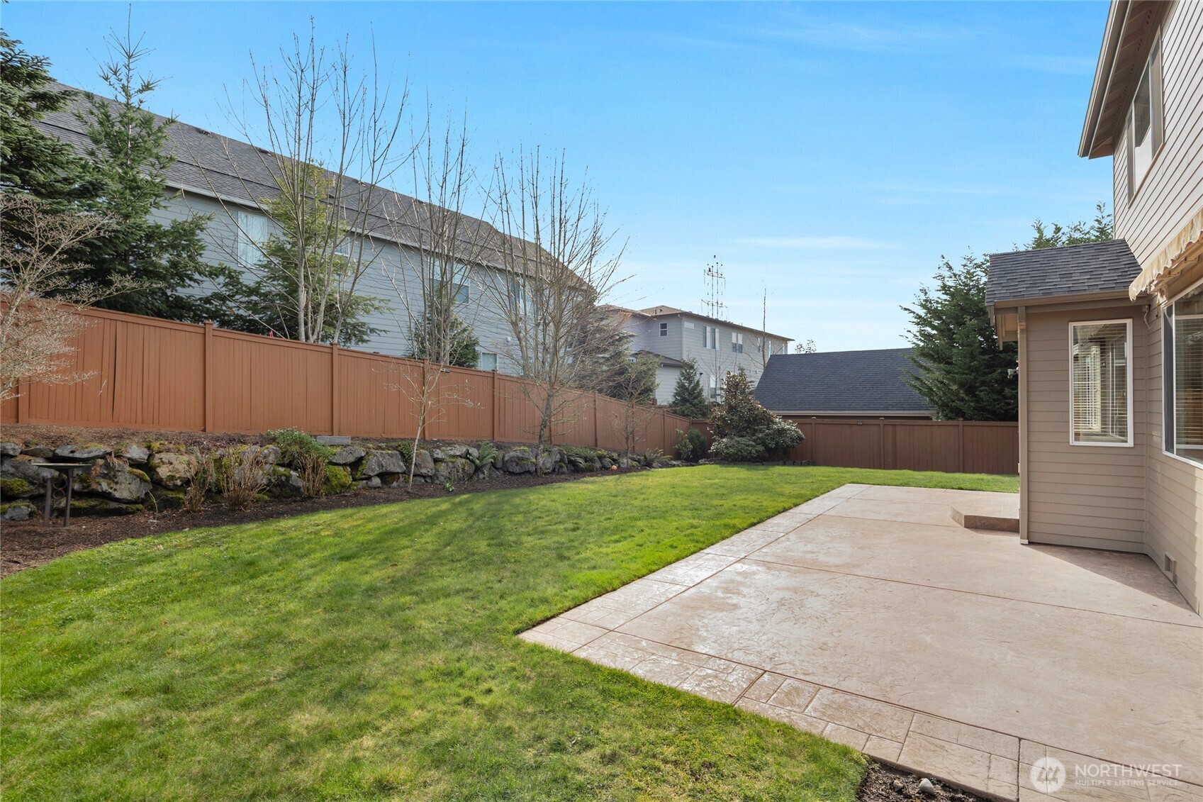 4326 221st Street Southeast Bothell, WA 98021 - Photo 29 of 34 a view of a back yard of the house
