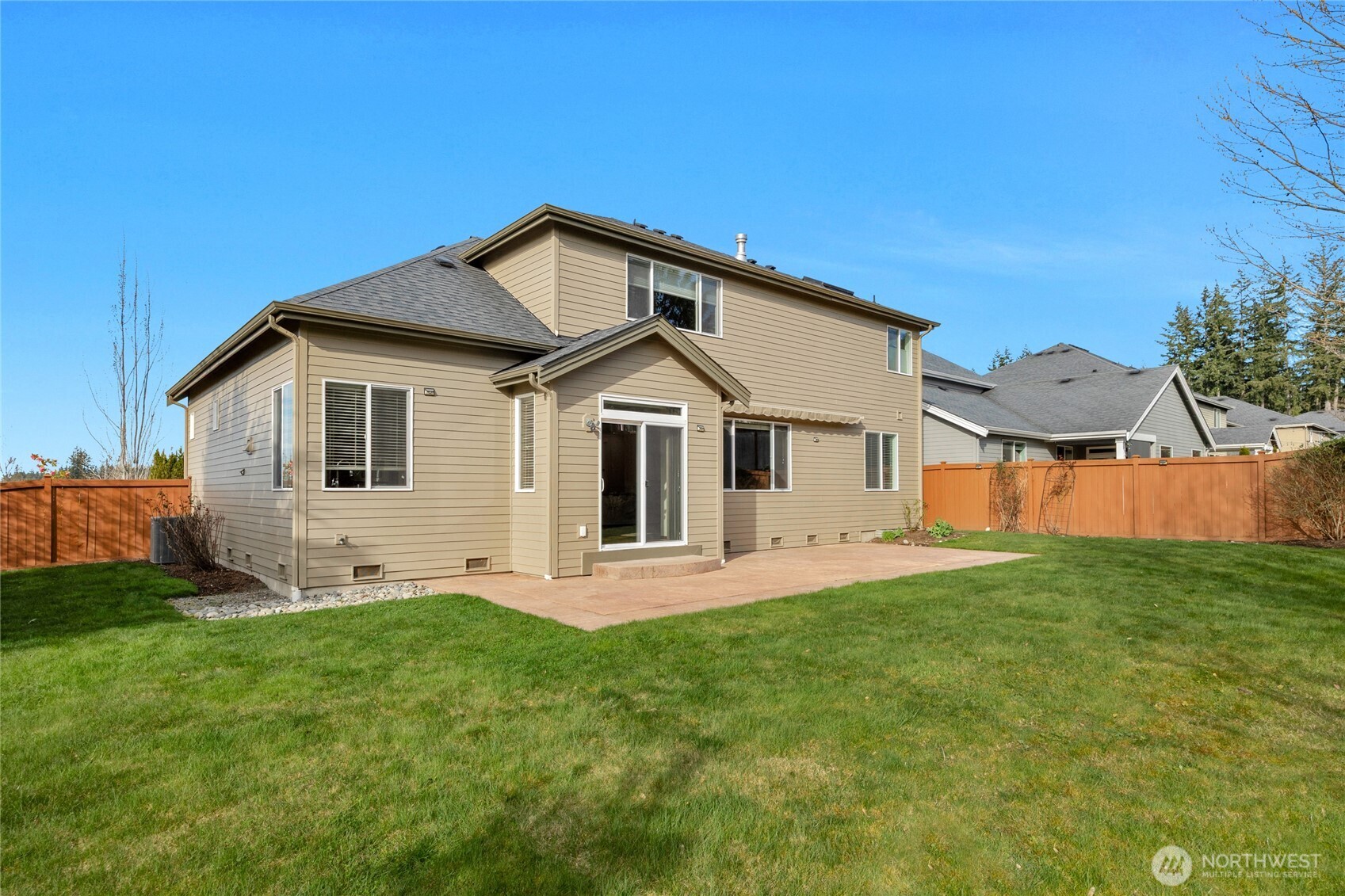 4326 221st Street Southeast Bothell, WA 98021 - Photo 31 of 34 a front view of a house with a yard