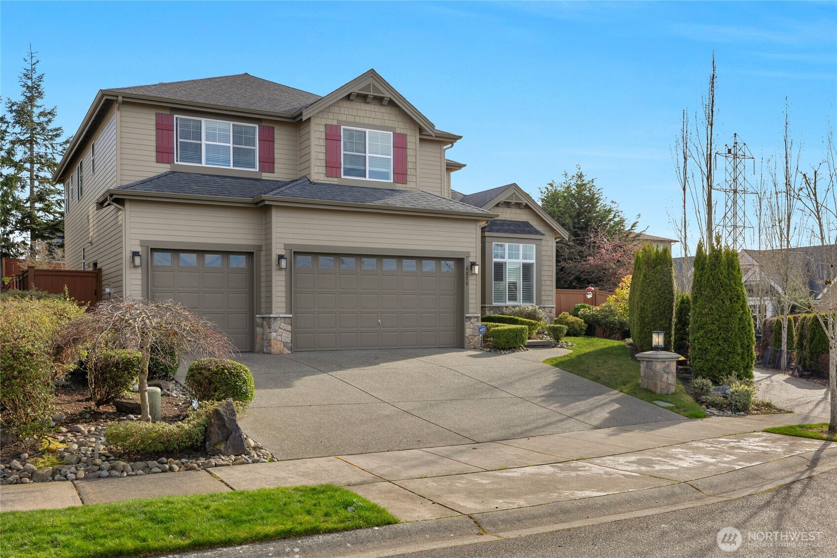 4326 221st Street Southeast Bothell, WA 98021 - Photo 34 of 34 a front view of a house with garden