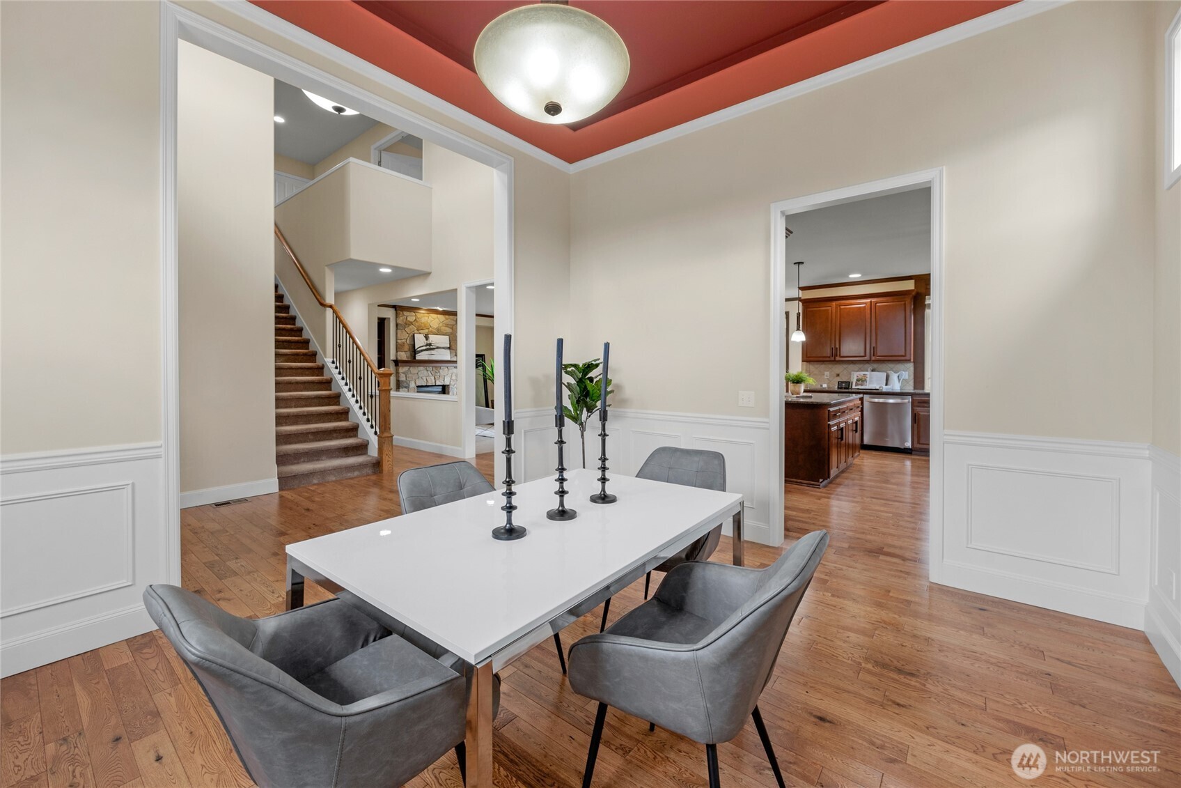 4326 221st Street Southeast Bothell, WA 98021 - Photo 5 of 34 a view of a dining room with furniture and wooden floor