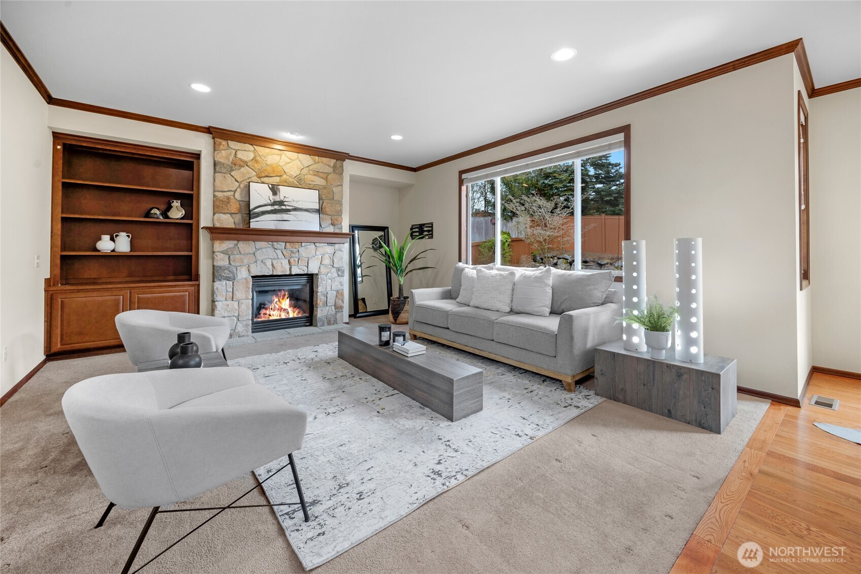 4326 221st Street Southeast Bothell, WA 98021 - Photo 7 of 34 a living room with furniture and a fireplace