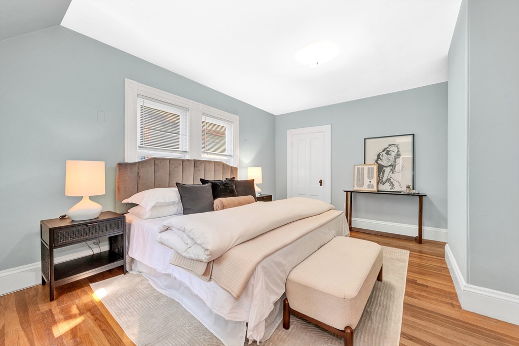 42 St Rose Street Boston, MA 02130 - Photo 18 of 41 a bedroom with a bed and a couch
